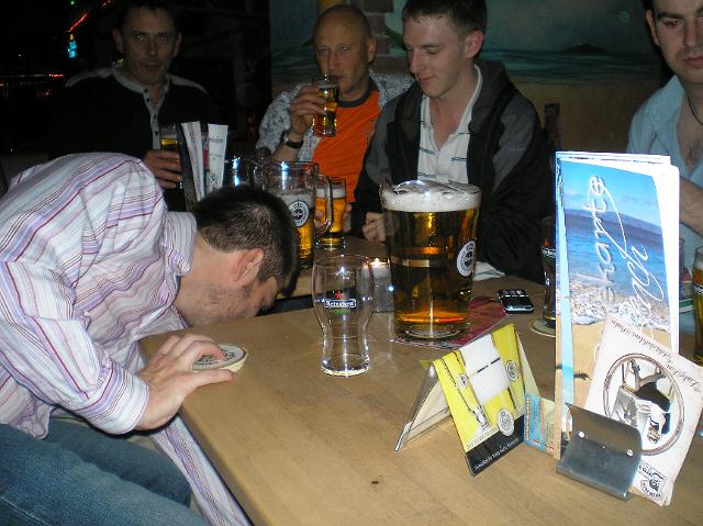 P6120038.JPG - This is how to pick up a beer mat. Mine's a bucket of beer s'il vous plaît